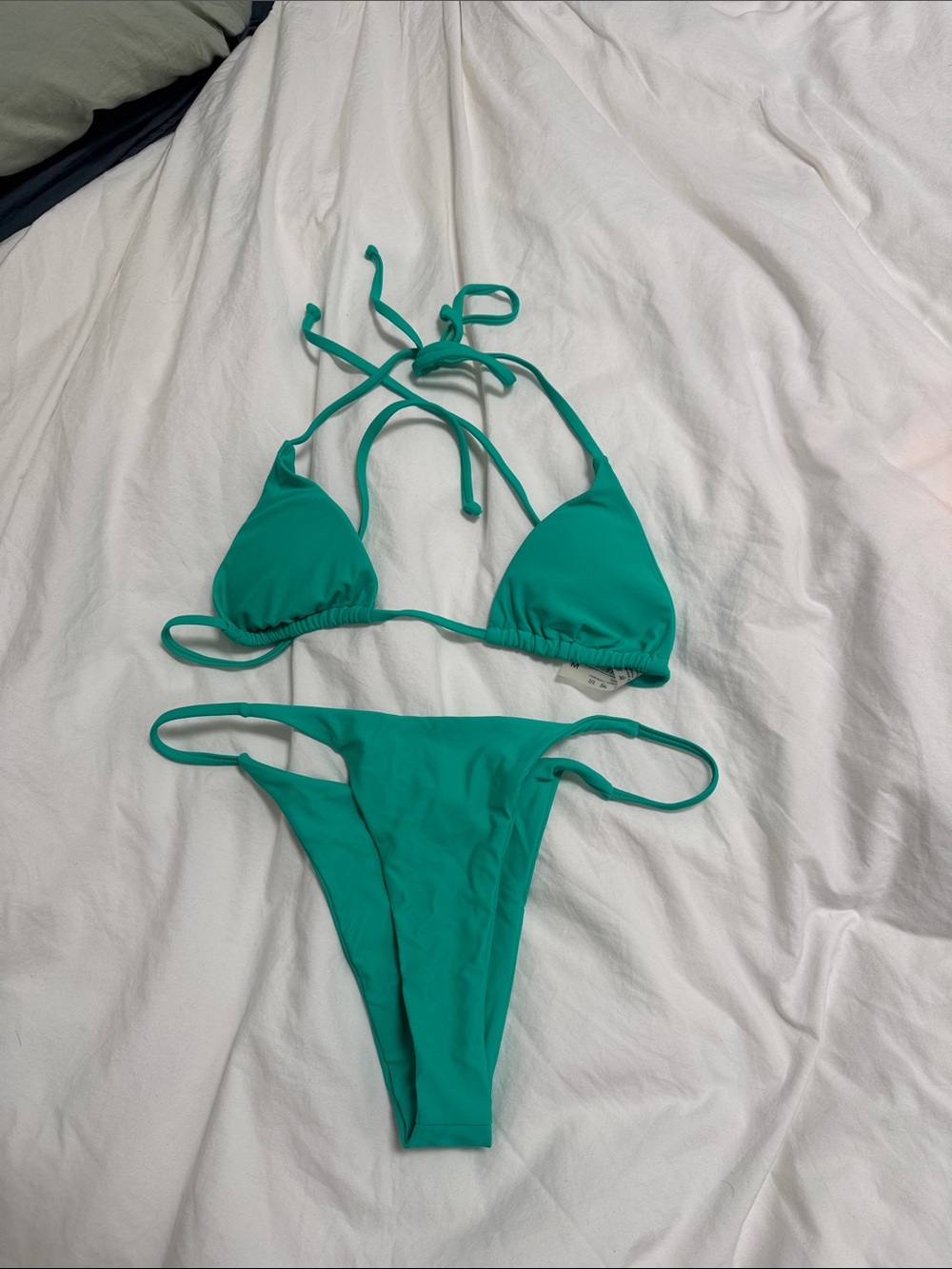 Bright teal bikini